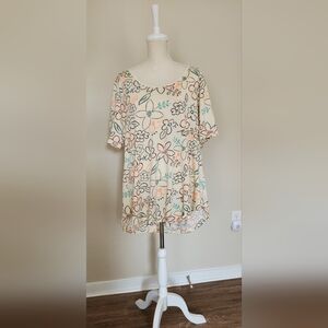 LuLaRoe Cream Top with Black and Orange Floral Design